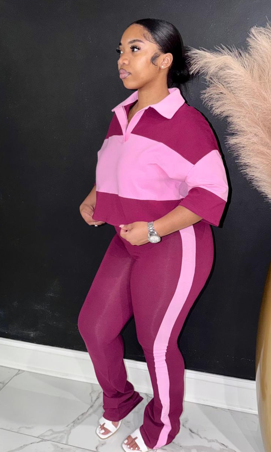 Stripe Love (Pink) two-piece set featuring a colorblock collared crop top, high-waisted flare pants, and contrast side stripes for a sporty, effortless look.