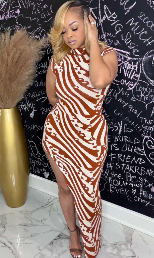 Side view of The Rust Zebra Knit Dress highlighting fitted silhouette and sleeveless design