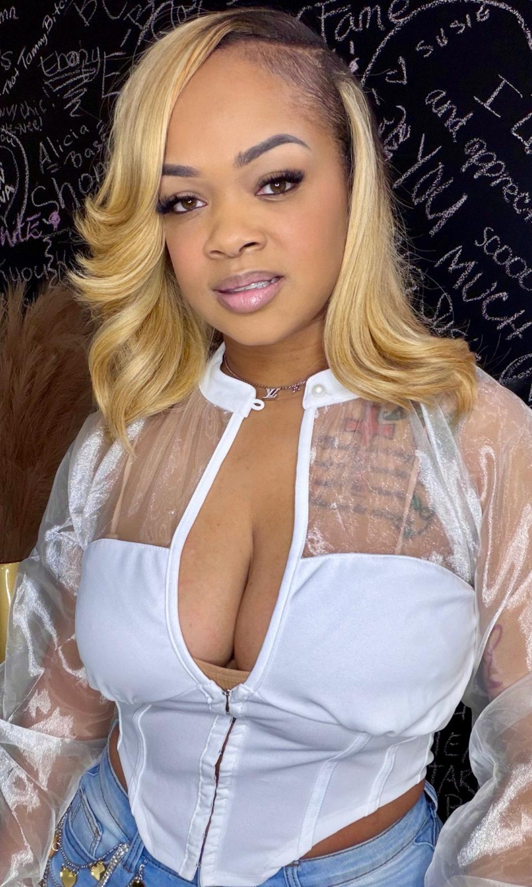 Close-up of Barely There White Top highlighting corset-style fit and sheer fabric detail