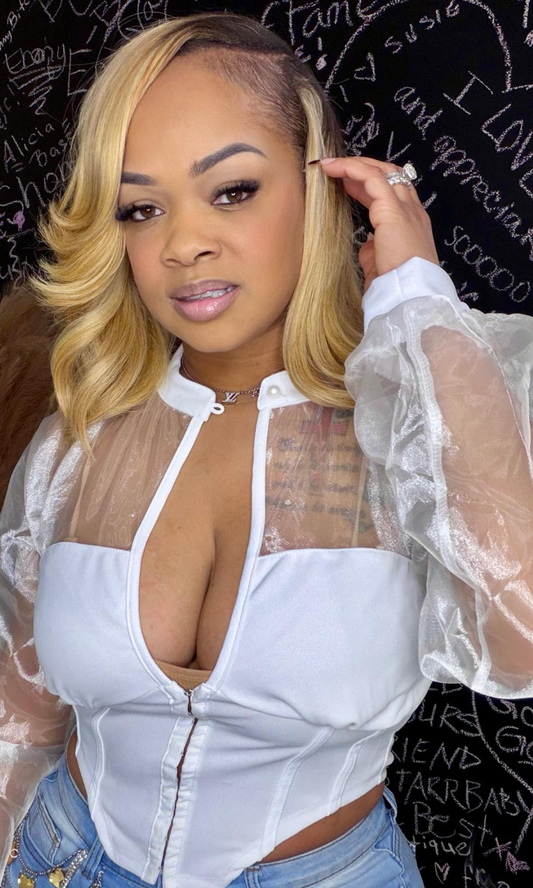 Model wearing Barely There White Top with sheer mesh sleeves and plunge neckline