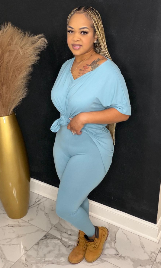 Model wearing Basic Set Dusty Teal in size medium, front view styled with boots.