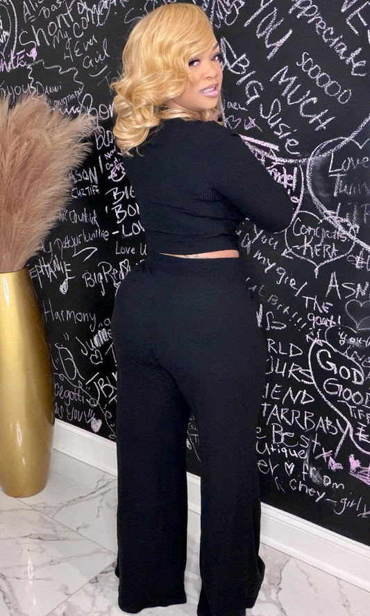 Back view of Black Julia Set highlighting wide-leg silhouette