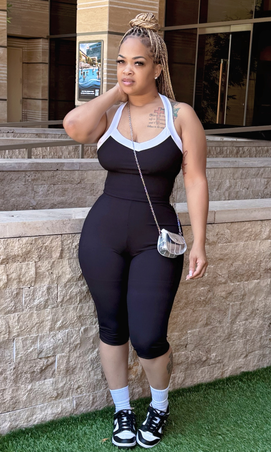 Black & White 2-piece set side pose – Model wearing medium size, highlighting fit and flattering cut of the outfit.