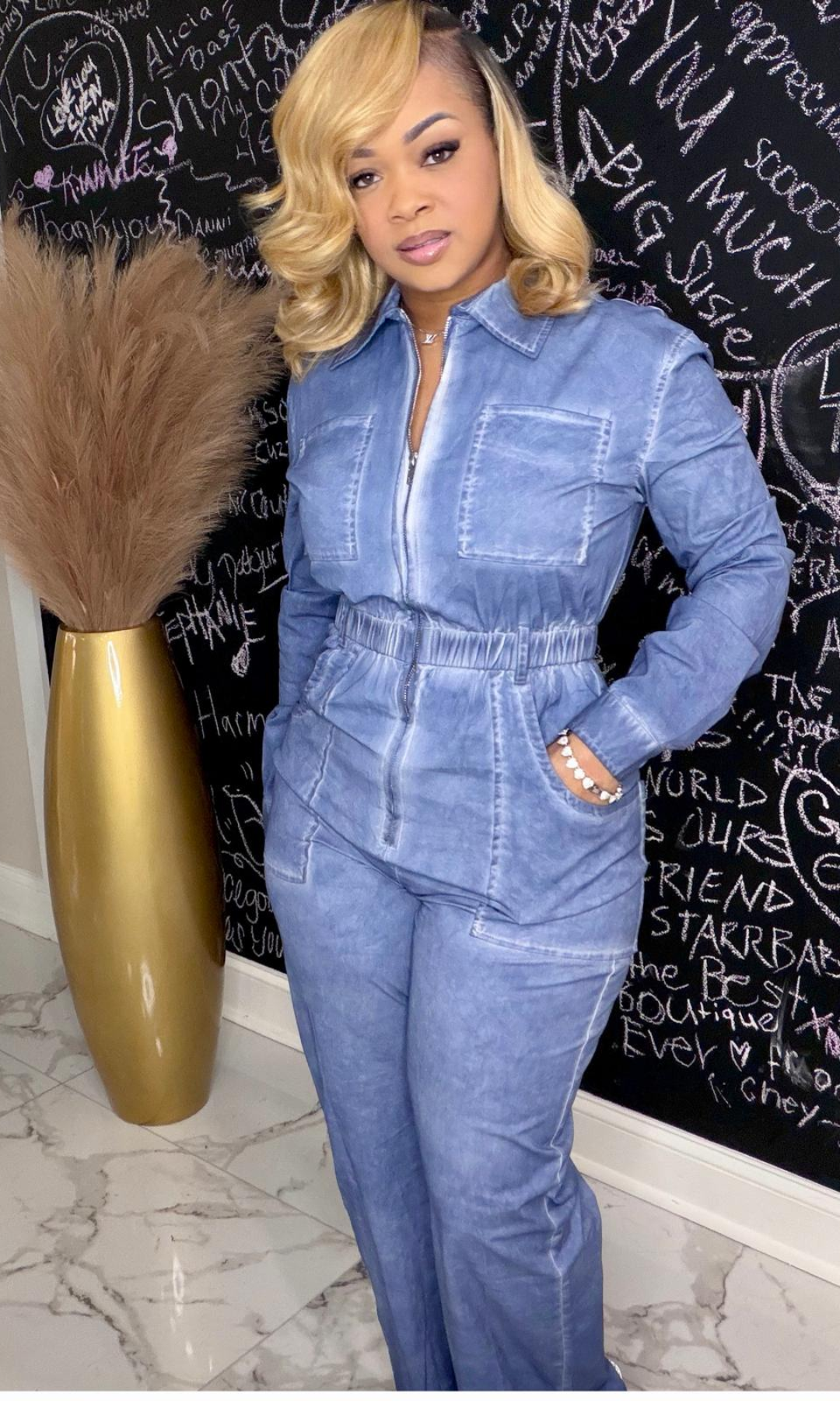 Model wearing Blue Skies Light Jean Jumper with zip-front and elastic waist