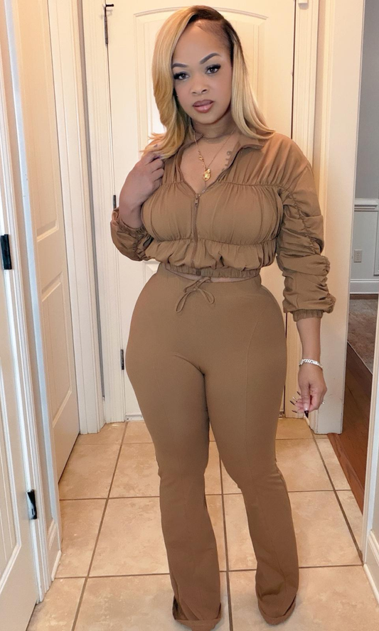 Brown body set with zip-front cropped jacket and high-waist flare pants, front view
