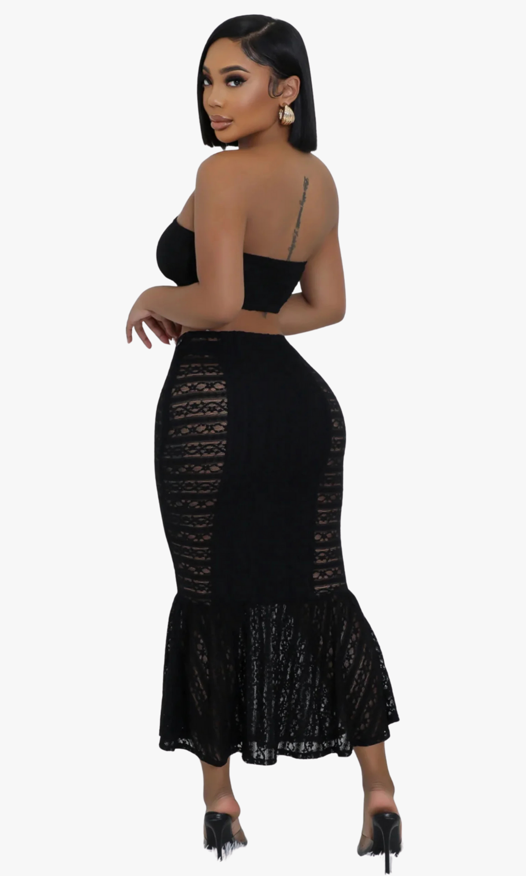 Woman wearing a Butterfly black lace 2-pc outfit skirt on a white background