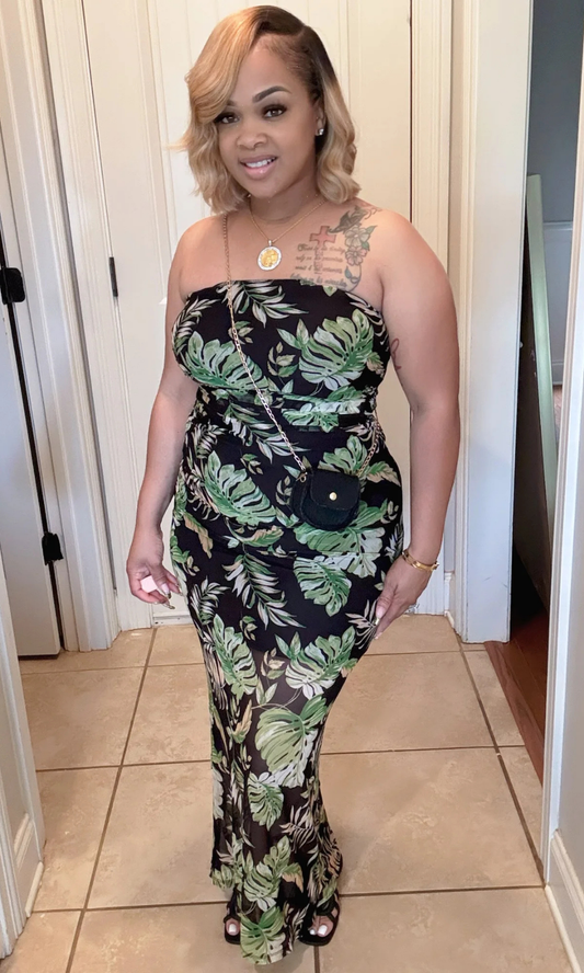 Woman wearing a strapless floral dress in a home setting. Classy Summer Black so classy and classic!