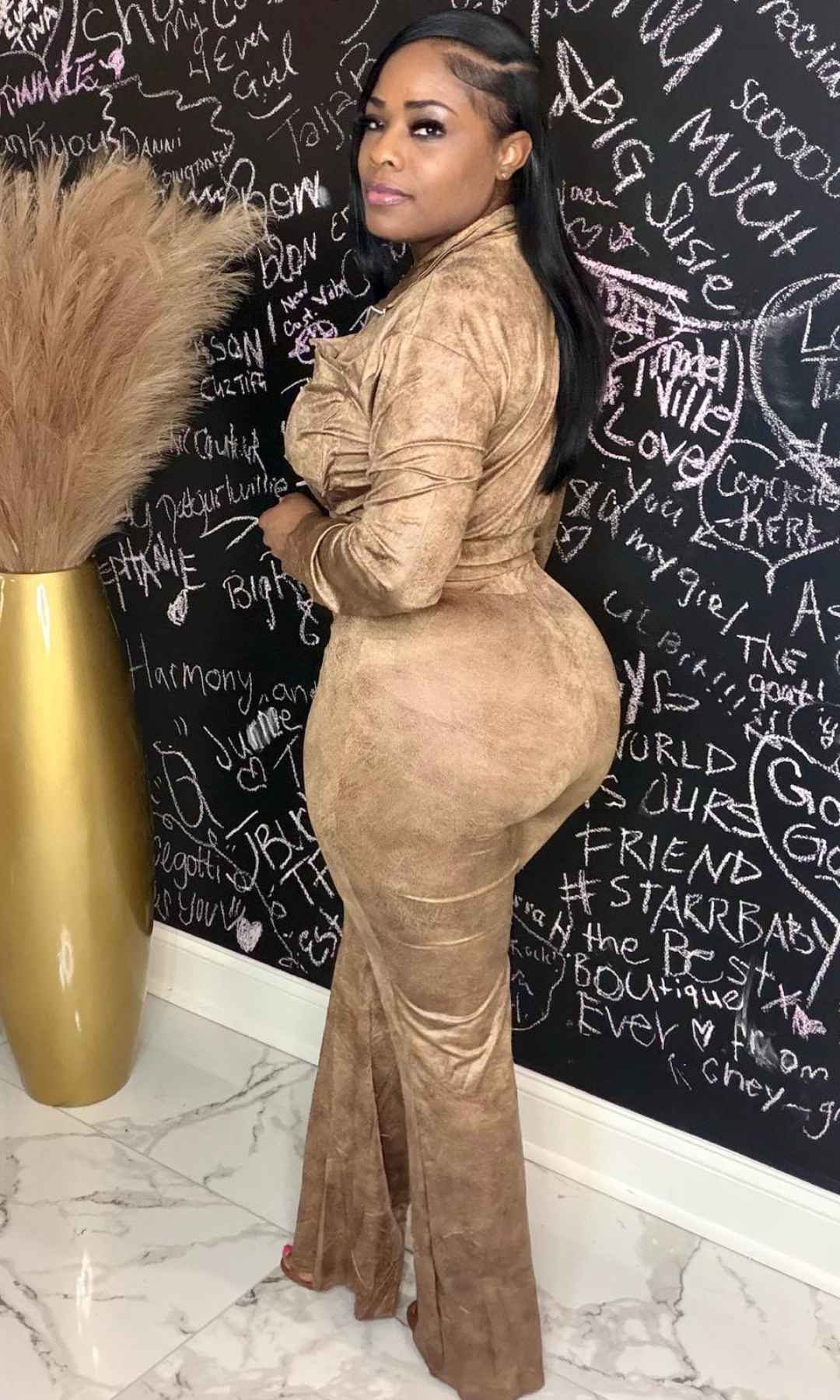 Back view of Cocoa Luxe Utility Pant Set with high-waisted wide-leg pants