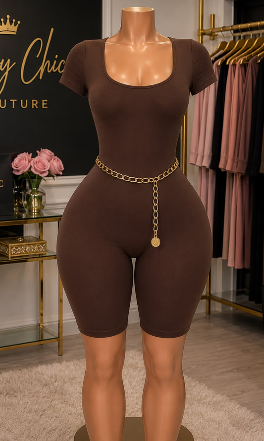 Women's coffee brown fitted romper with a scoop neckline, short sleeves, biker shorts, and buttery-soft stretch fabric.