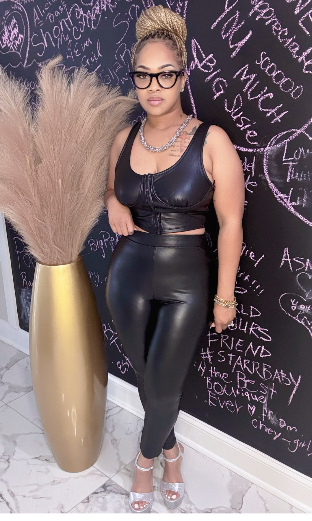 Dark Leather 2-piece set front view with crop top and fitted pants.