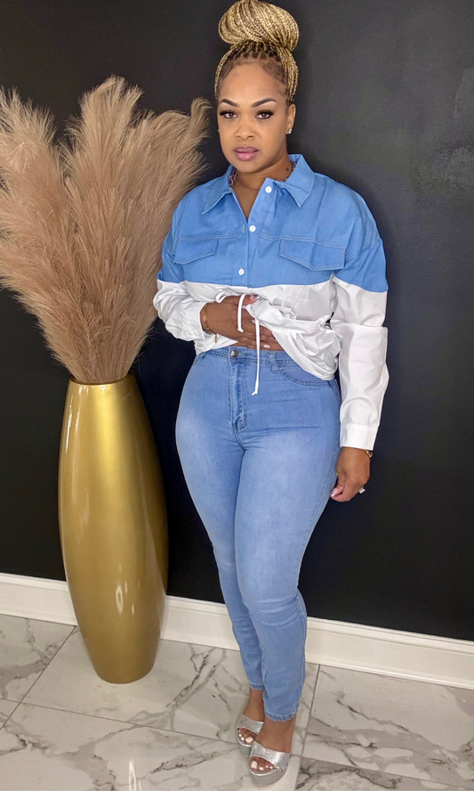 Model wearing Denim Blue stretch skinny jeans, front view with button-up shirt.