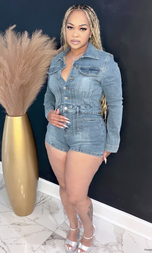 Denim long sleeve button romper front view with fitted waist and collared neckline