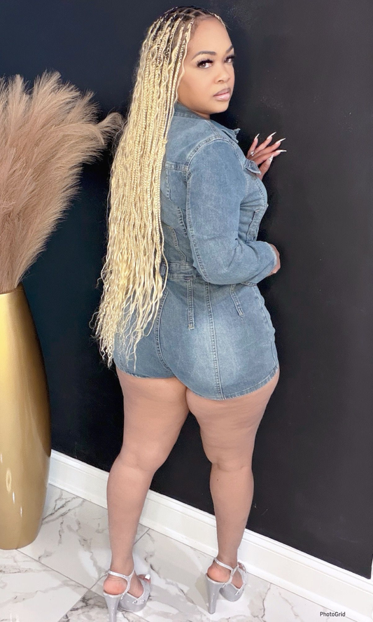 Denim long sleeve button romper back view showing fitted silhouette and short length