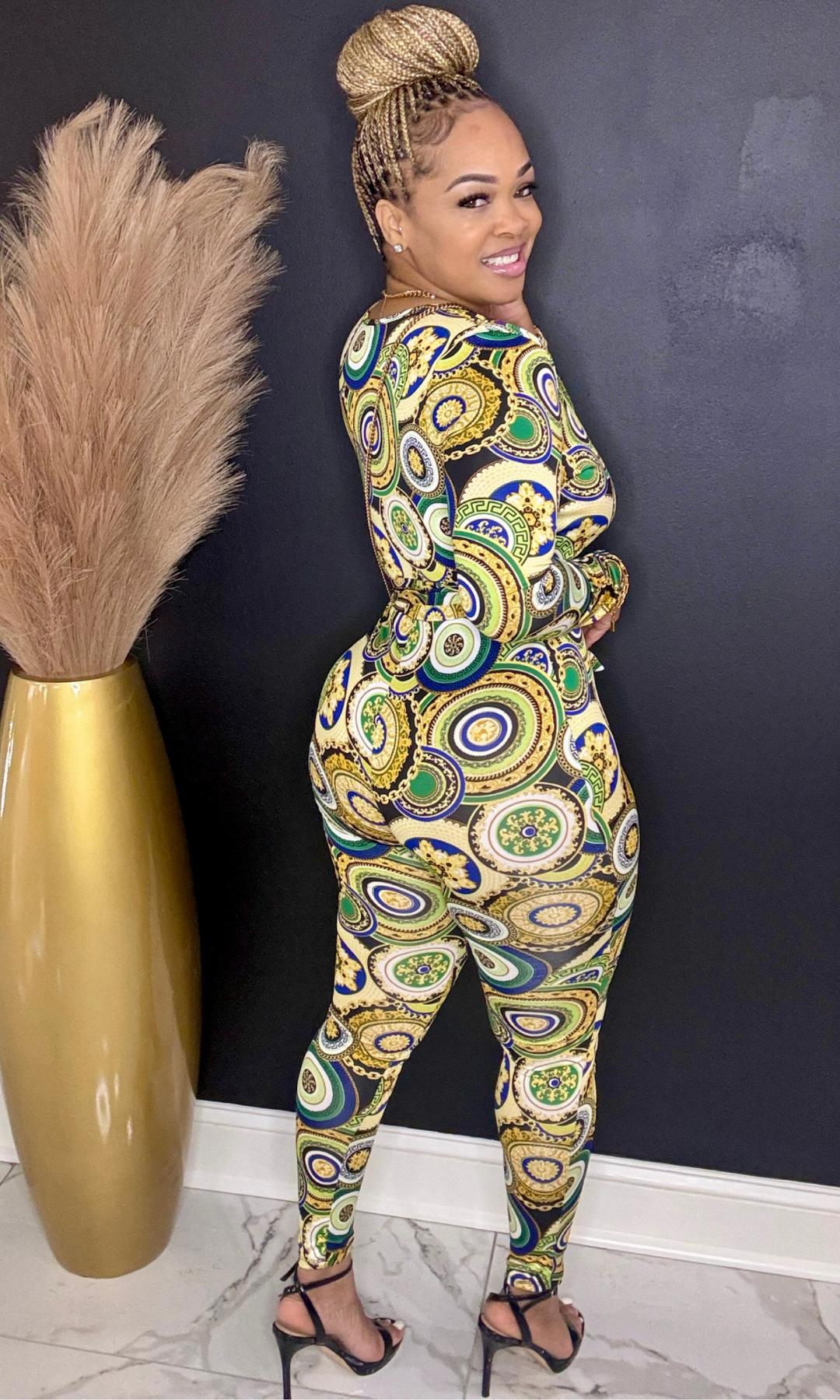 Back view of Green & Gold Lux jumpsuit showcasing curve fit