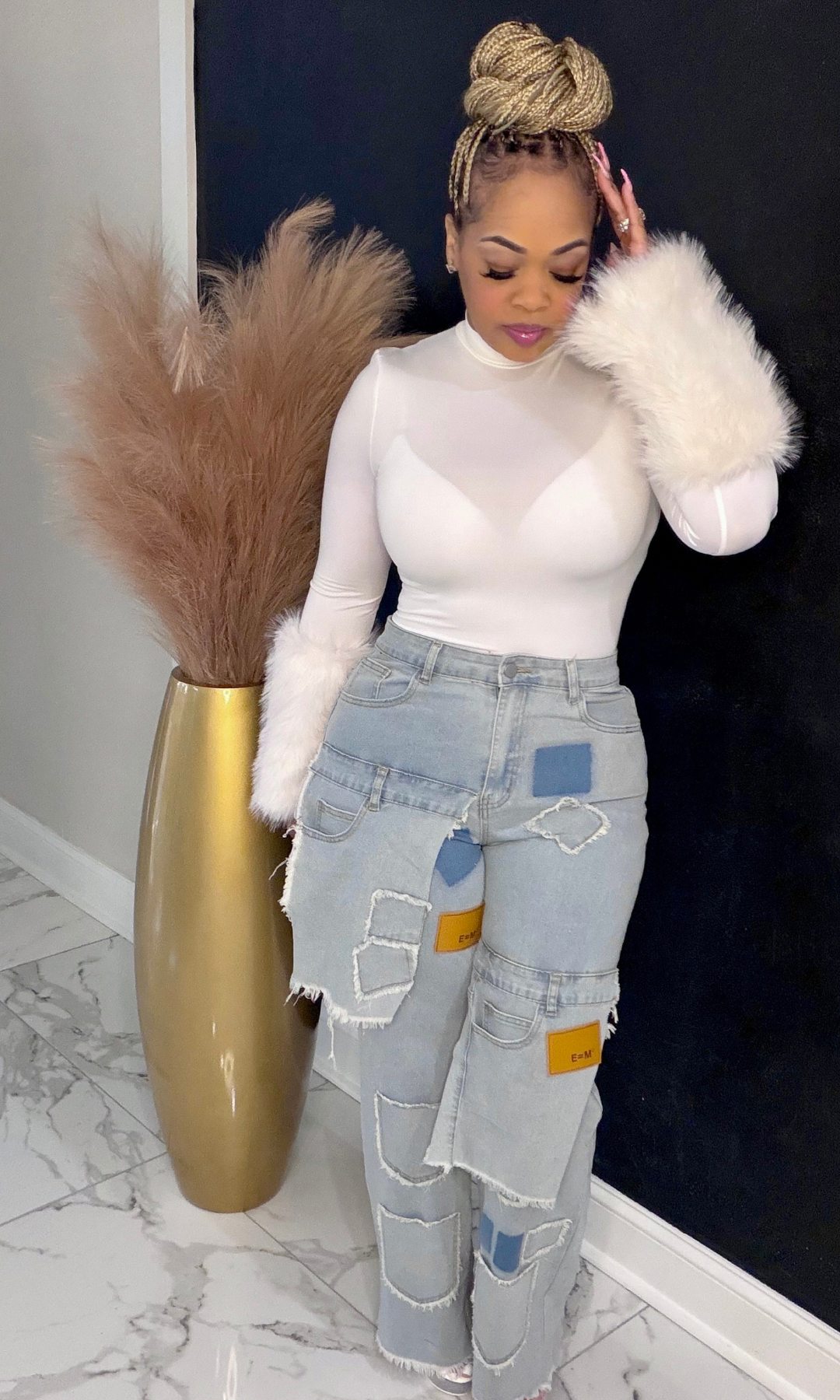 Front full-length view of Patchwork Power Jeans showing distressed patchwork details and cargo pockets.