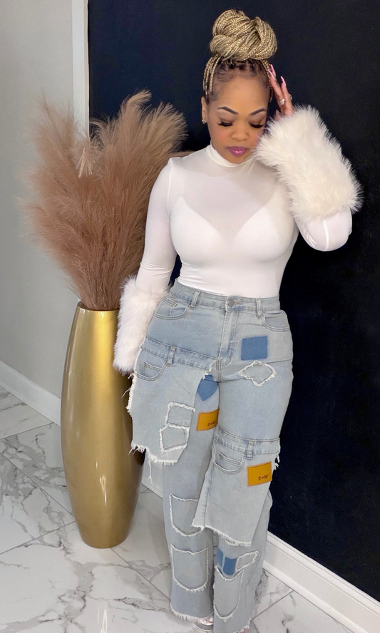 Front full-length view of Patchwork Power Jeans showing distressed patchwork details and cargo pockets.