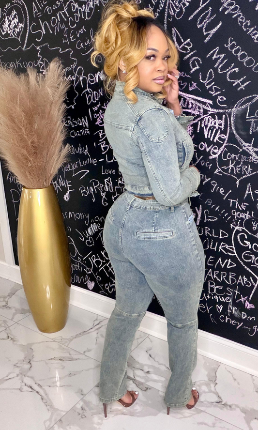 Side angle of baby blue jean zipper set highlighting structured denim fit