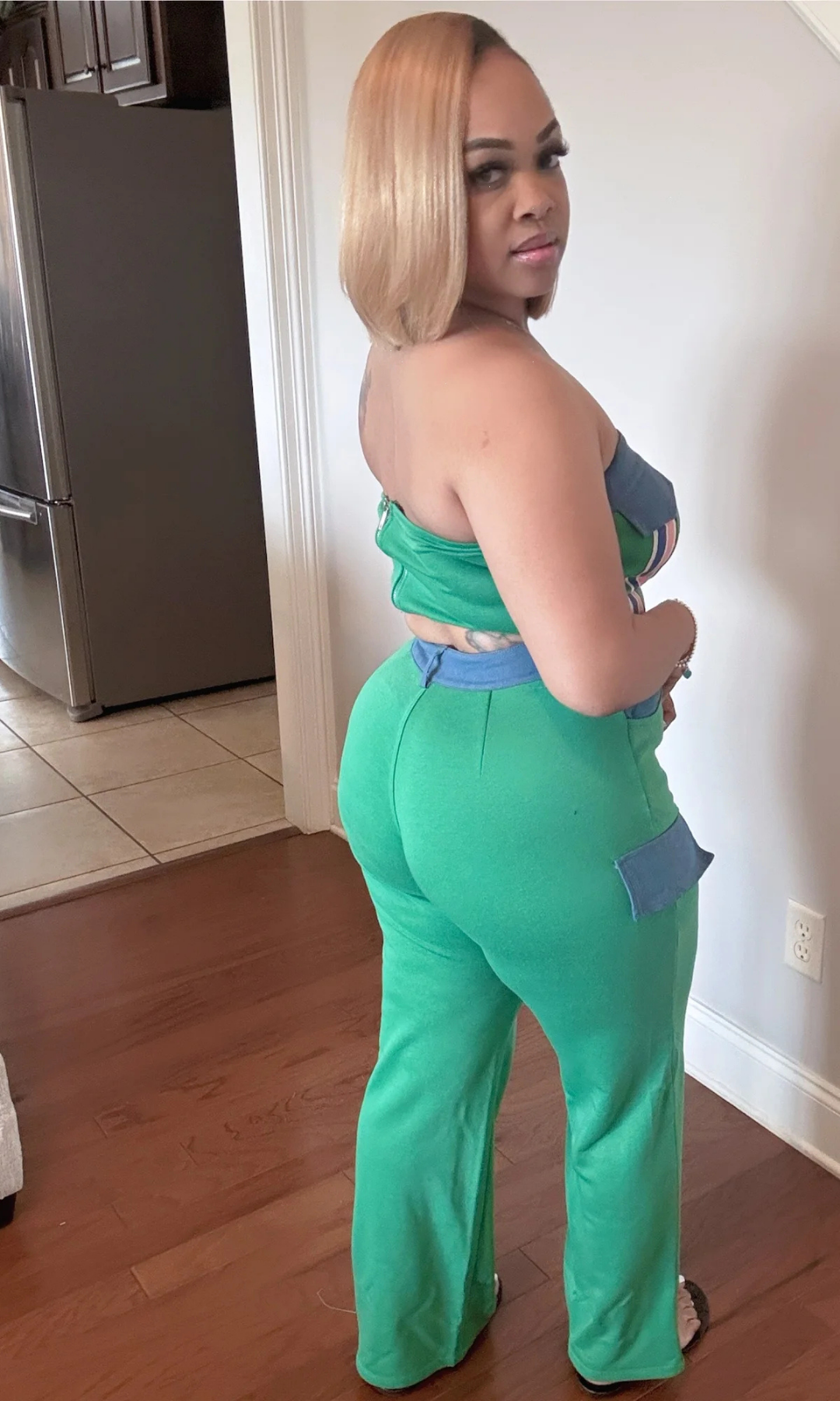 Side view of Mean Green Set showing tube top fit and pant silhouette.