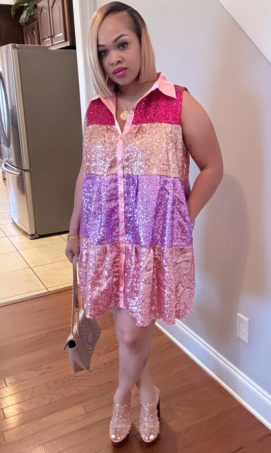 Woman wearing the Motha jumpsuit in a fitted bust and flared leg style, posing indoors.