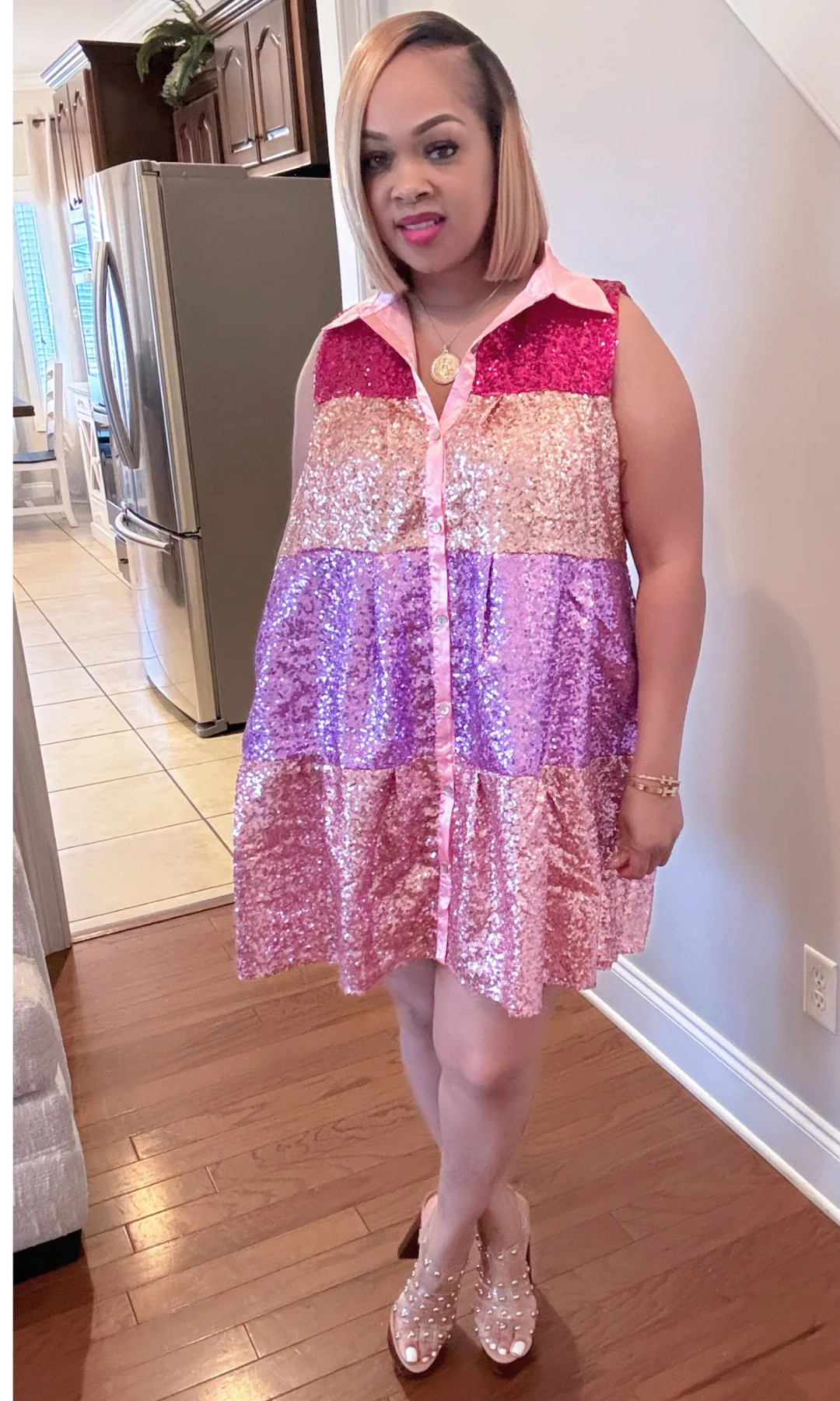 Full-body view of the Motha jumpsuit styled with heels.