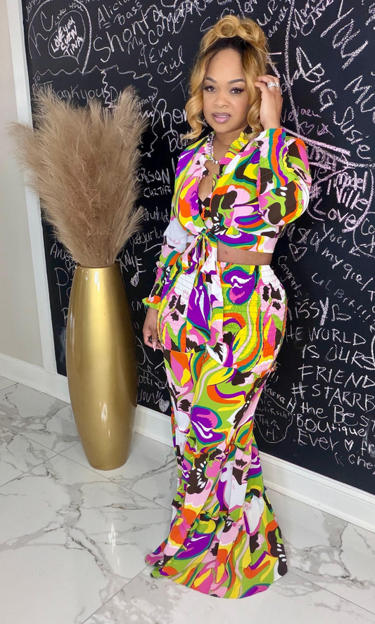 Model wearing colorful high-waist multi usage pants styled with matching crop top