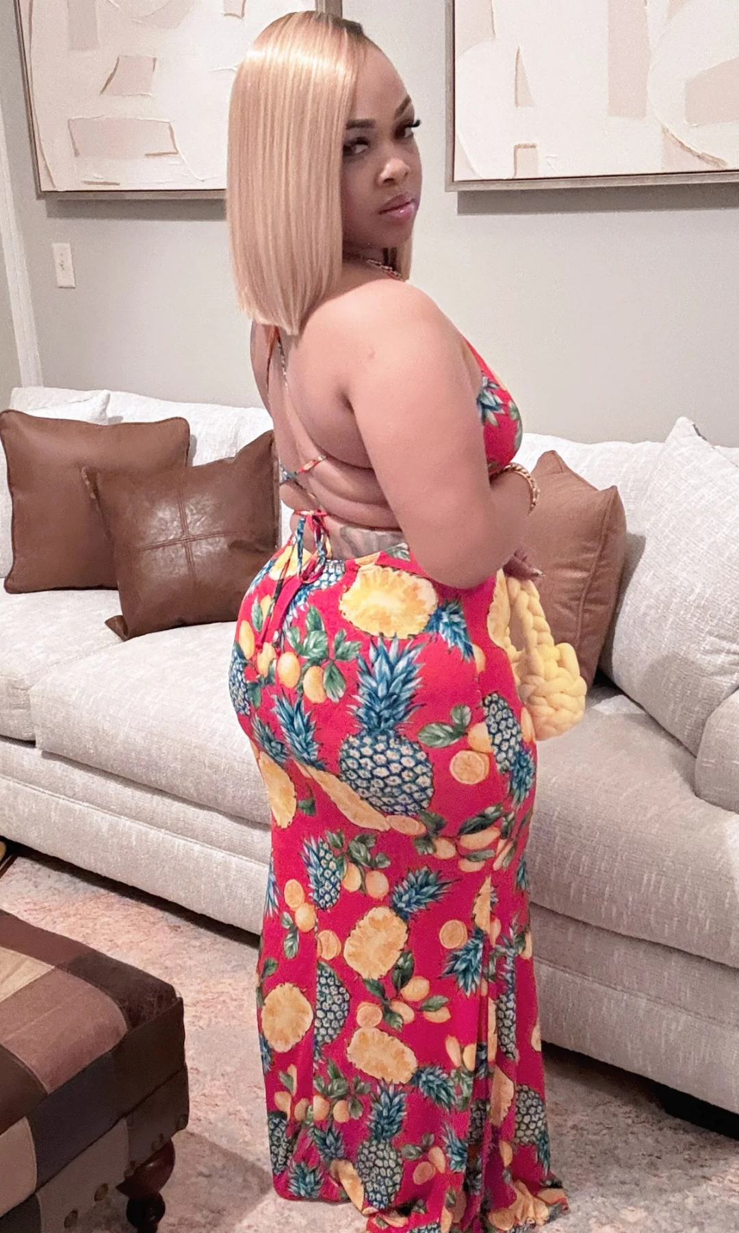 Back view of tropical pineapple print maxi dress on woman