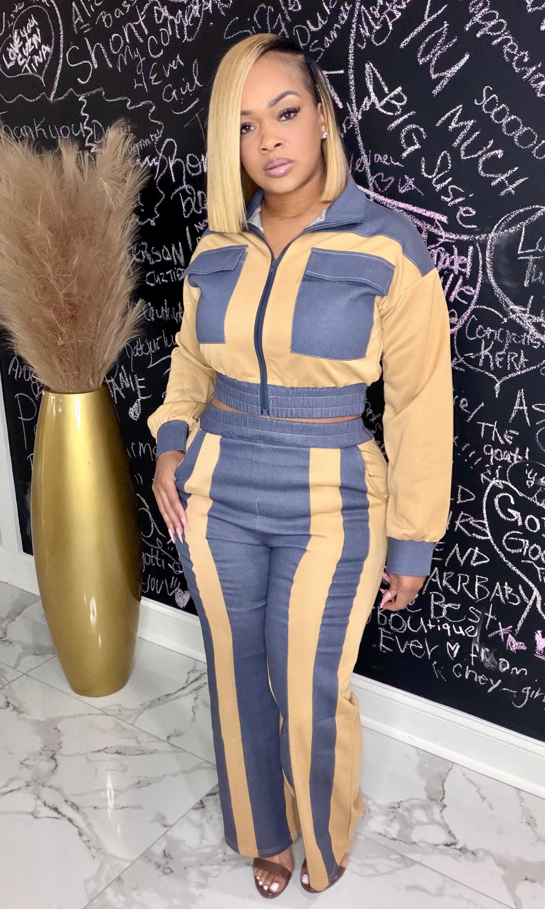 Woman wearing Polished Intentions Set with zip-front cropped jacket and high-waisted color-block pants, front view