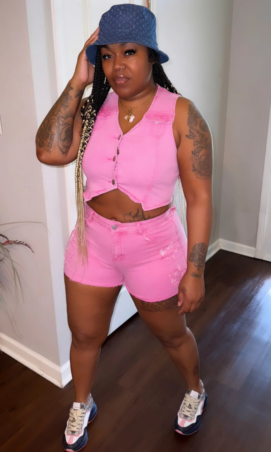 Woman wearing Poppin Pink 2-Piece Denim Set with cropped button-up top and high-waist shorts, front view.
