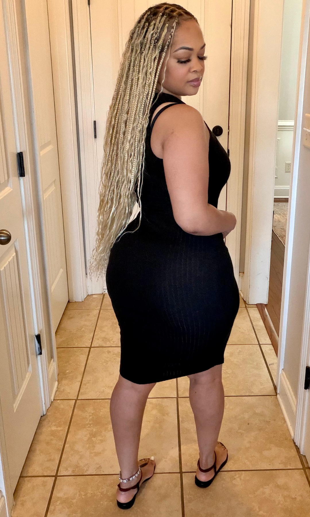 Black ribbed bodycon dress back view sleeveless fit