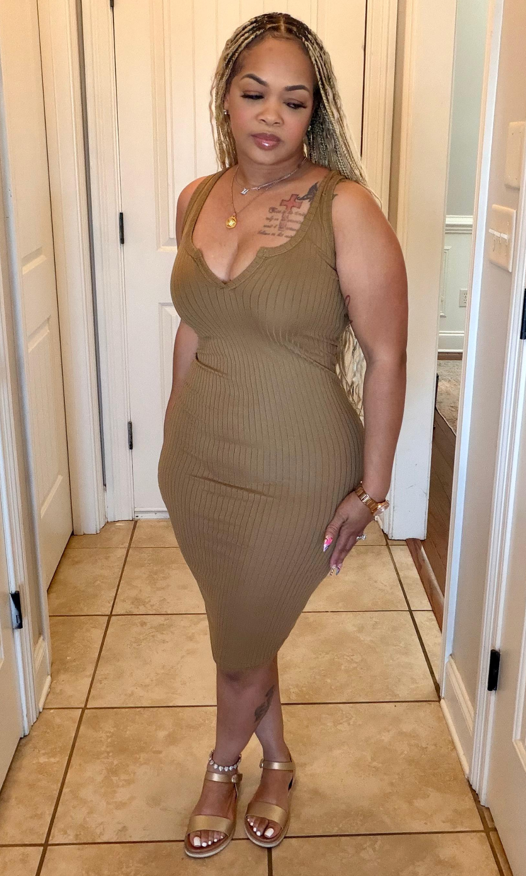 Ribbed mocha dress angled front view curve hugging silhouette