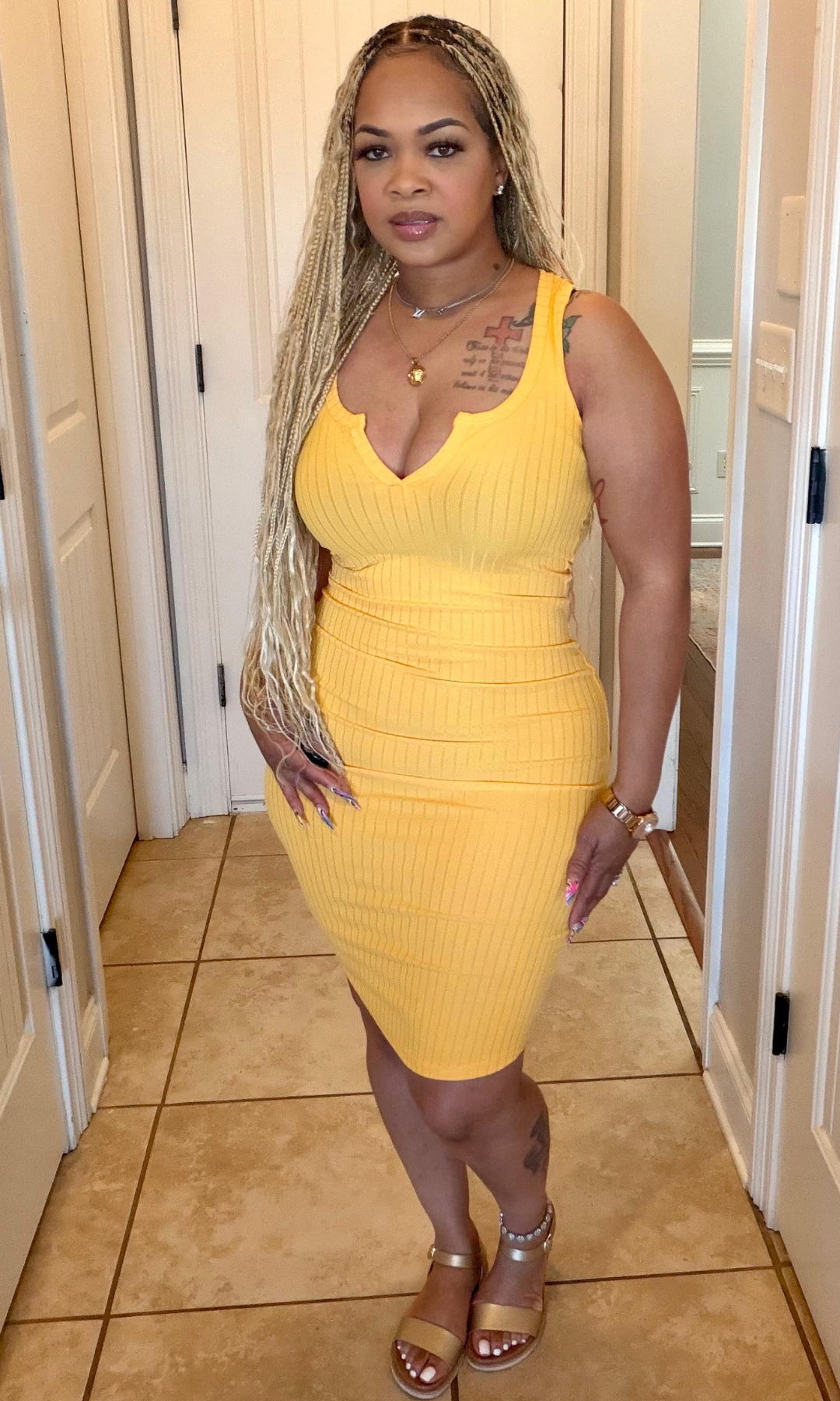 Ribbed yellow dress side angle curve hugging silhouette