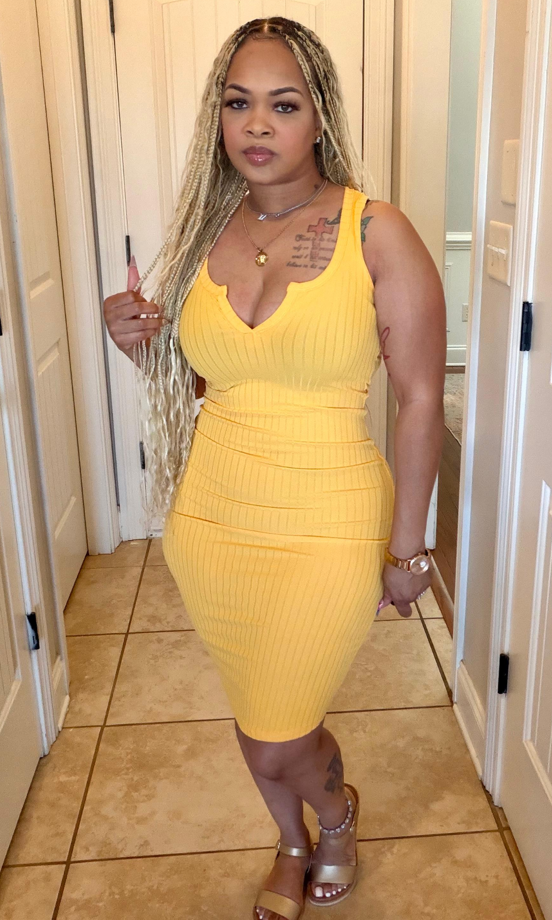 Yellow ribbed bodycon midi dress front view sleeveless fitted style