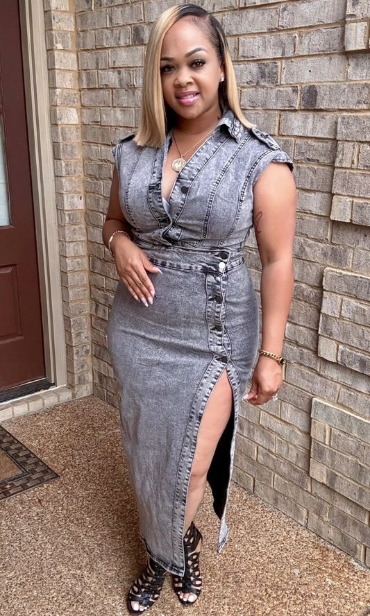 Front view of woman wearing the Slendid Split Dress in acid-wash denim with thigh-high split.