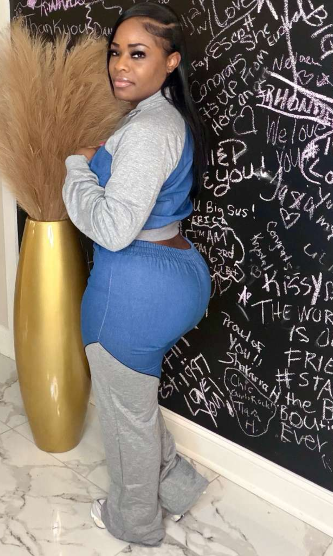 Side view of denim-look jogger set with contrast gray detailing