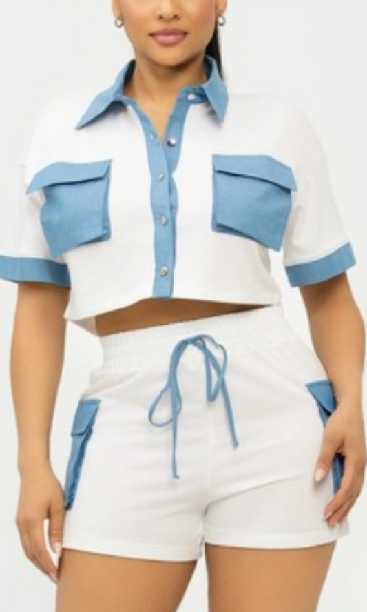 White and blue outfit with a cropped top and shorts on a white background