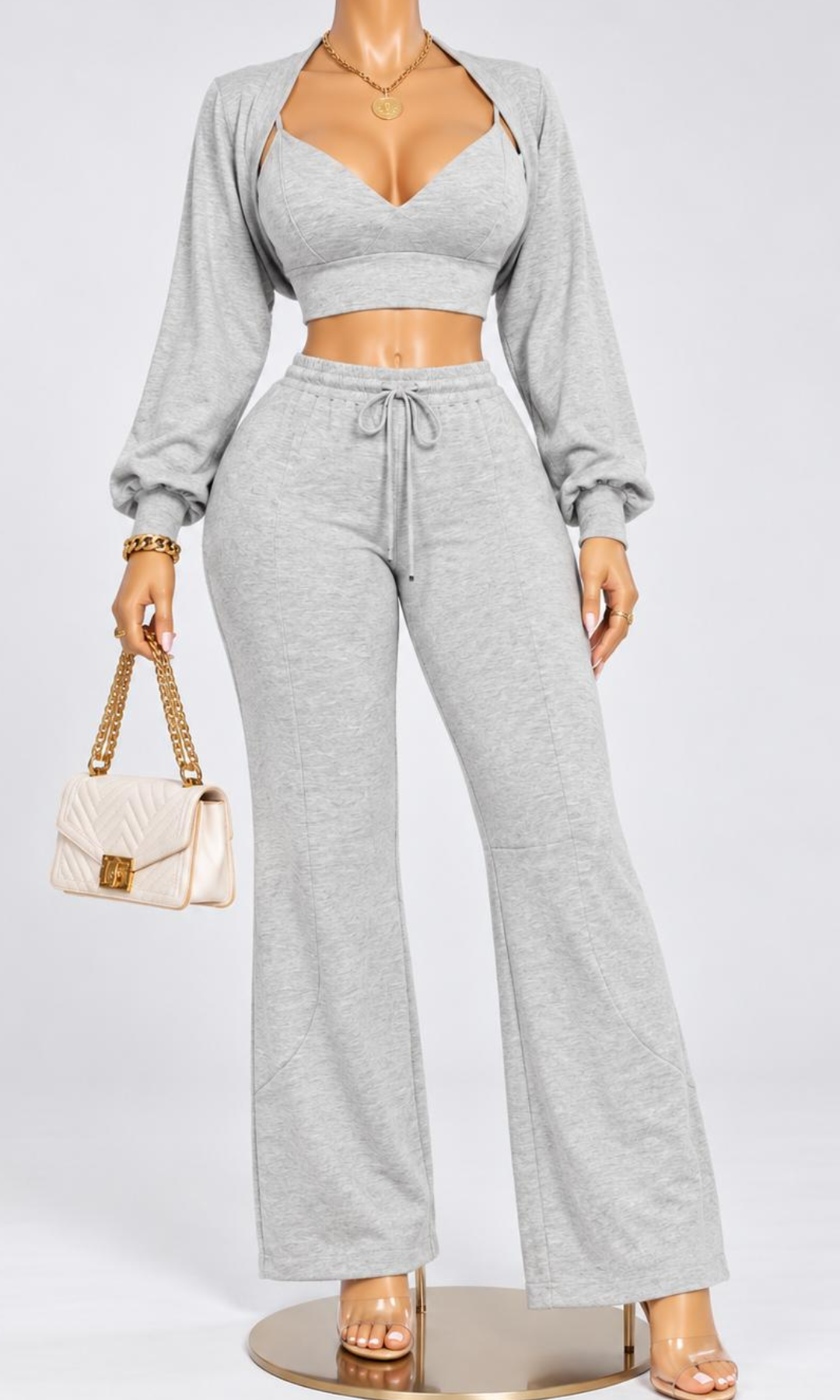 Don't Sweat Me gray three-piece set featuring a cropped sweetheart-neckline top, long-sleeve shrug, and matching high-waisted drawstring flare pants.