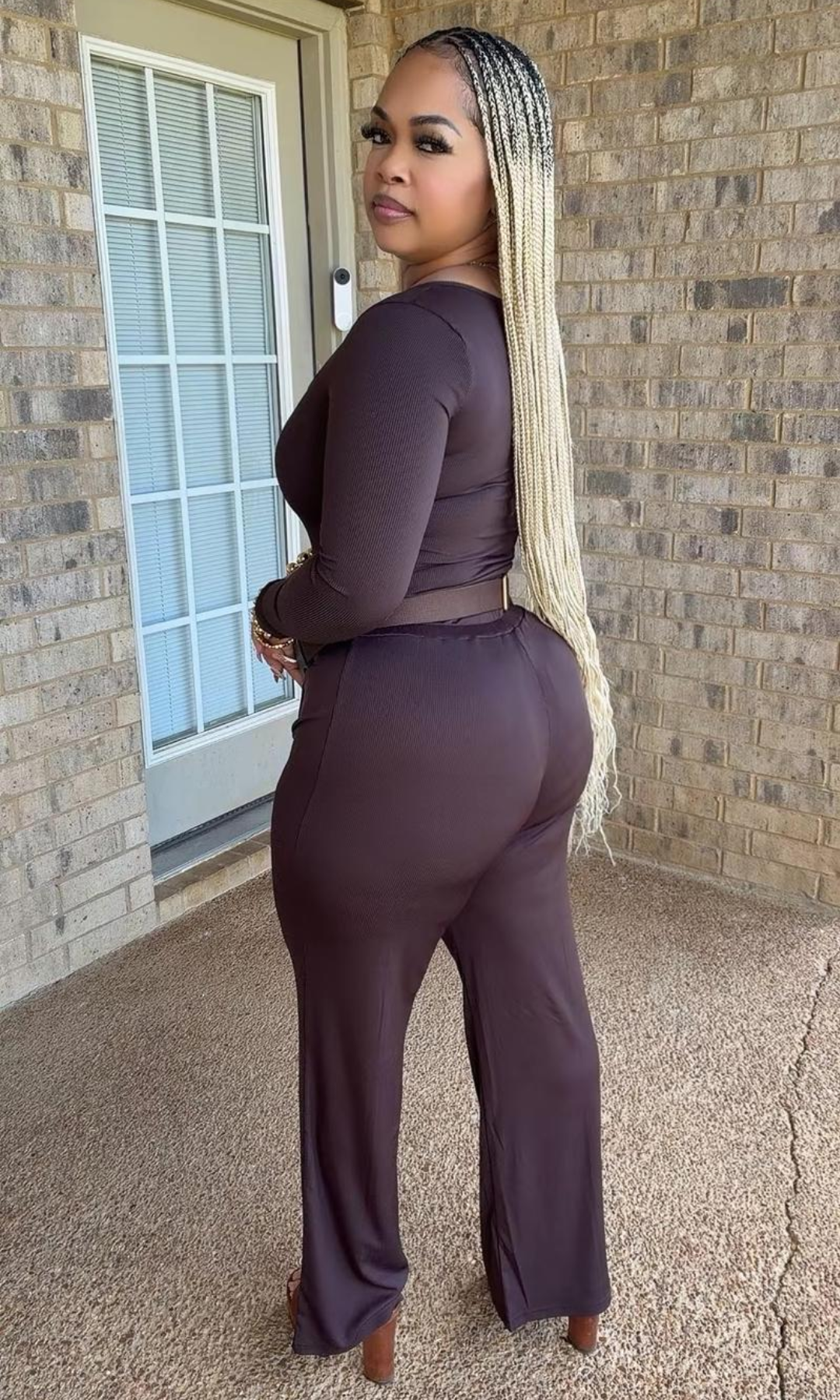 Side and back view of the Sweet Cocoa Bodysuit Set, highlighting the fitted ribbed bodysuit, high-waisted pants, and relaxed wide-leg silhouette in a rich cocoa-brown shade.